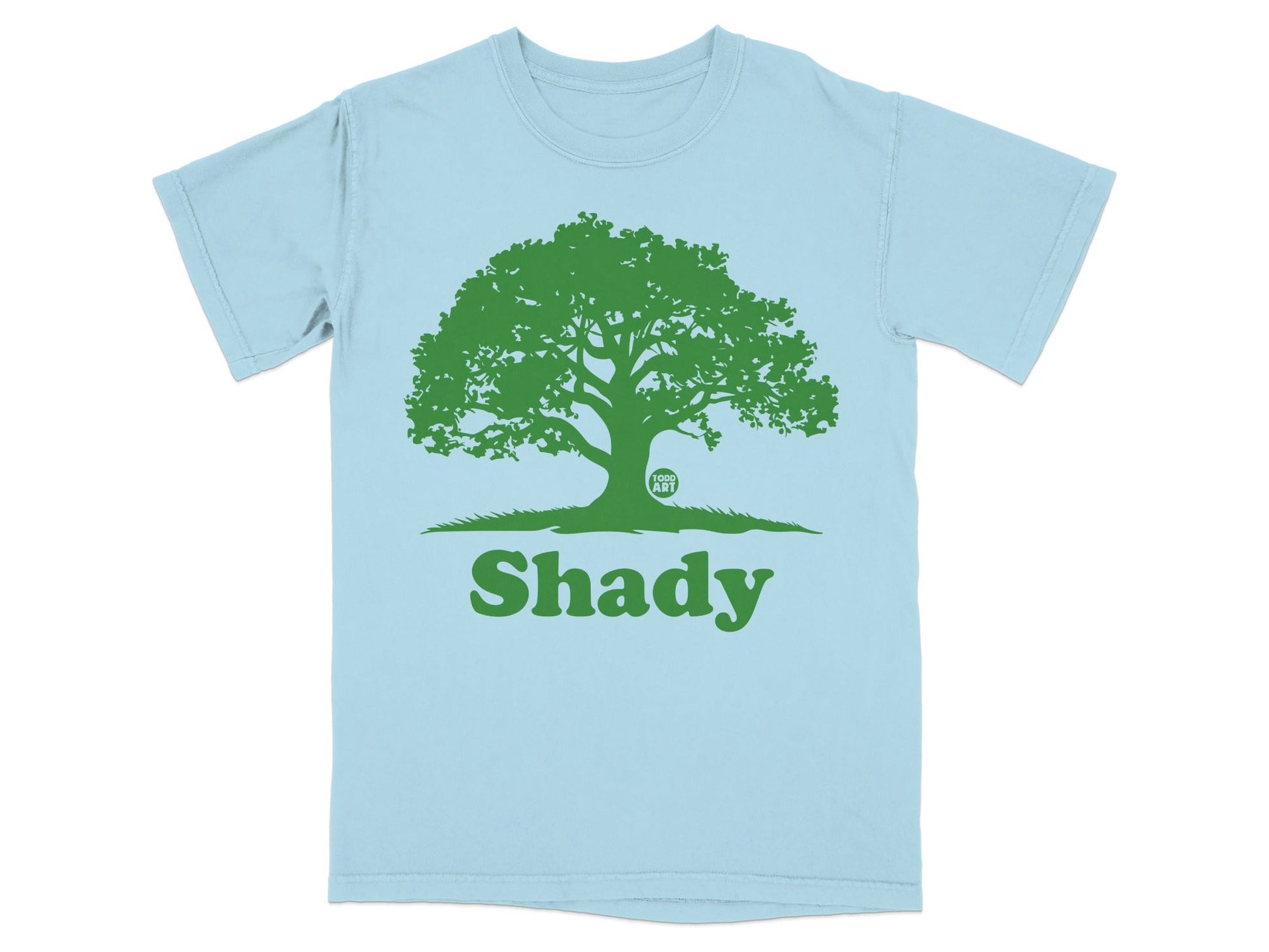 Light blue t-shirt with a green tree and the word "Shady" in green.