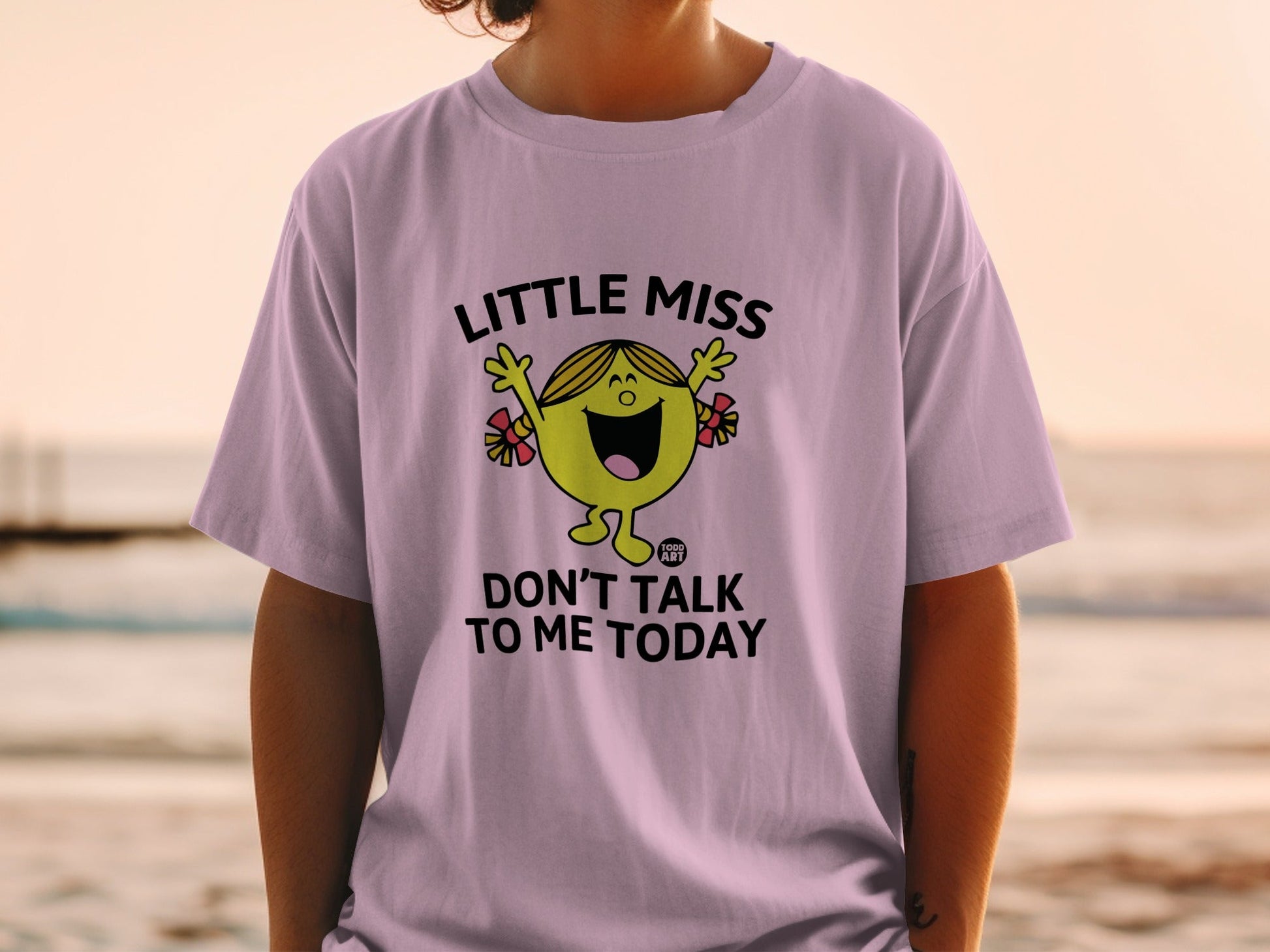 Lilac t-shirt with "Little Miss Don't Talk To Me Today" graphic.