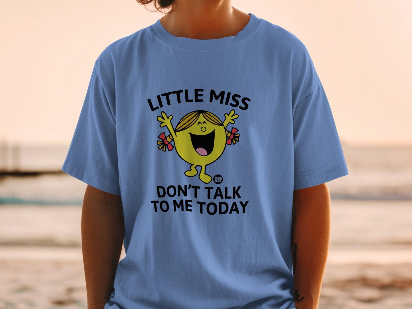 Blue t-shirt with "Little Miss Don't Talk to Me Today" text and cartoon character.