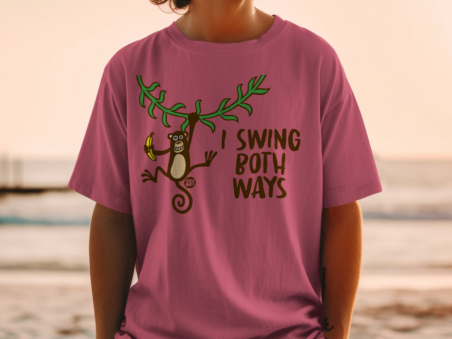 T-shirt with a monkey holding a banana and the text "I SWING BOTH WAYS".