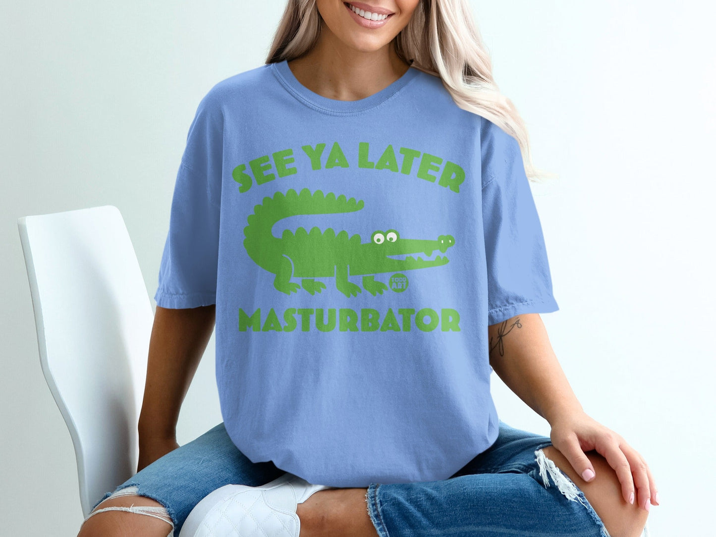 Green alligator graphic on a light blue t-shirt with "SEE YA LATER" text.