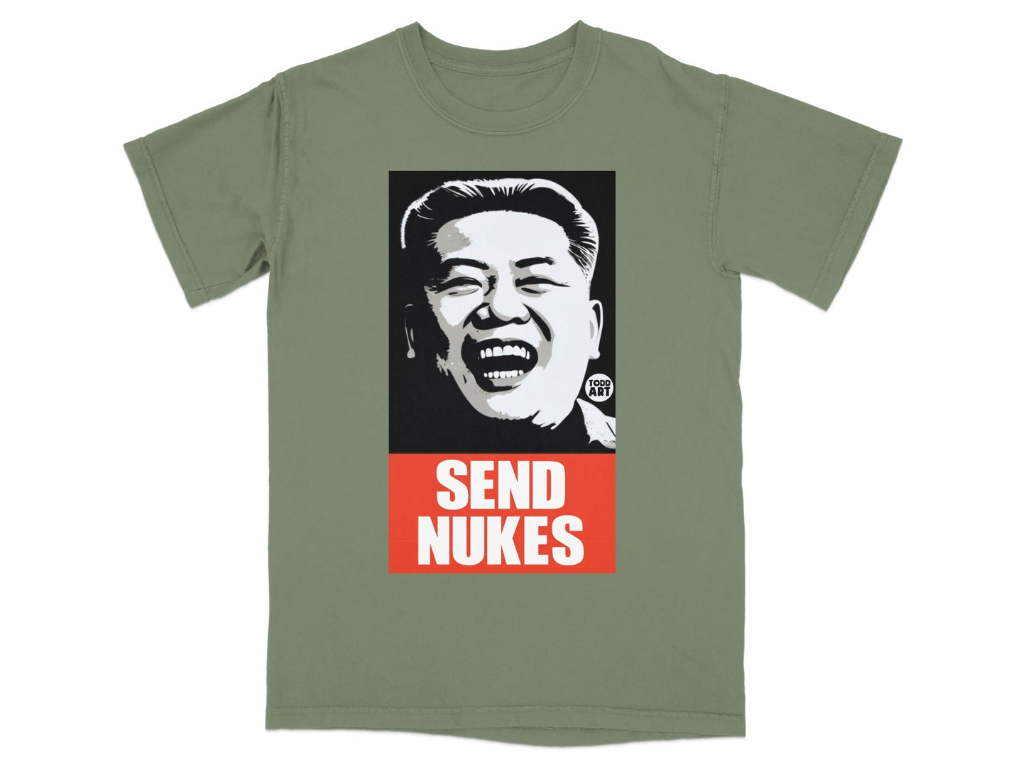 Green t-shirt with graphic of Kim Jong Un and "SEND NUKES" text.