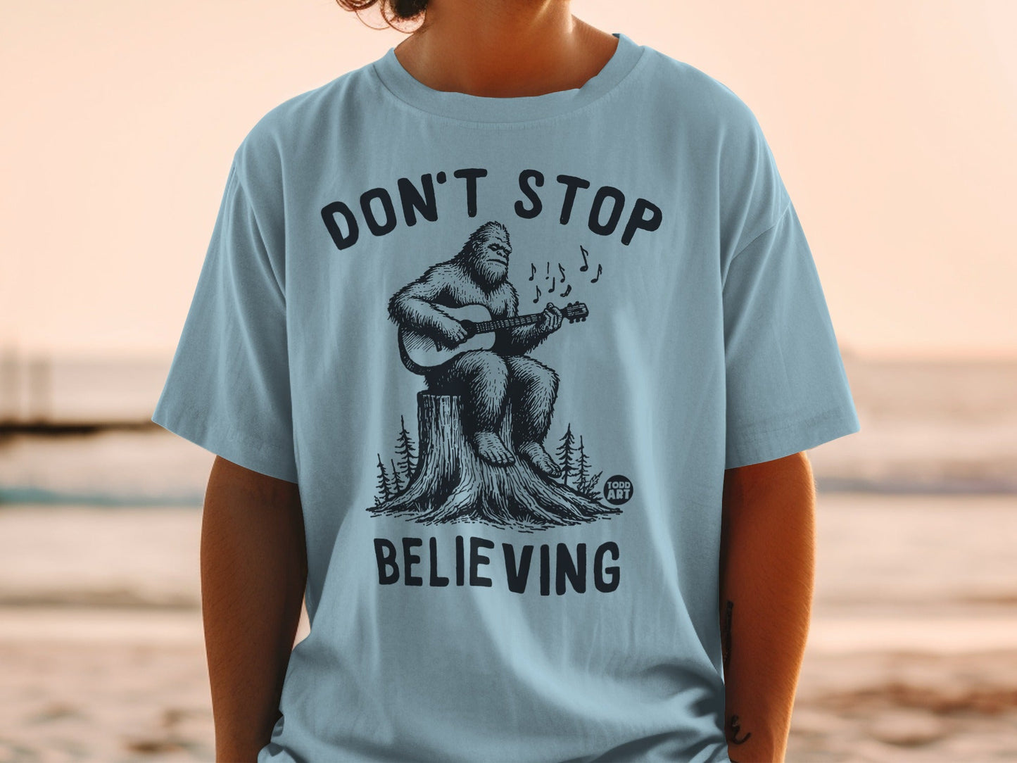 Don't Stop Believing Bigfoot Playing Guitar T-Shirt