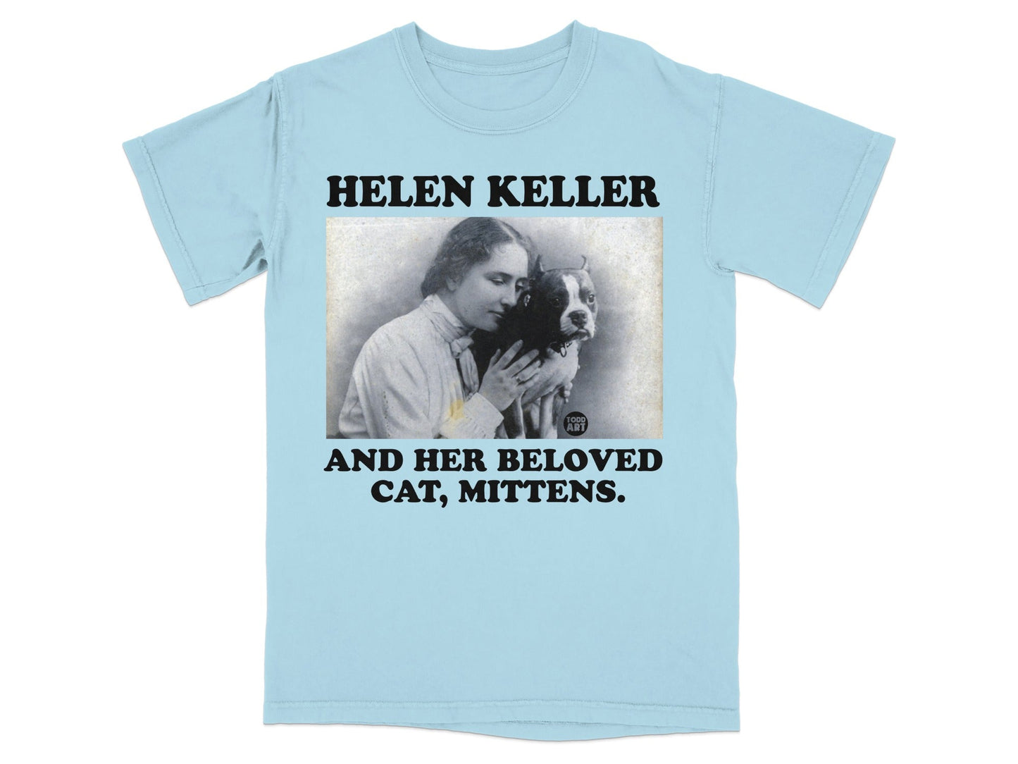 Light blue t-shirt with black text and an image of Helen Keller holding her cat.