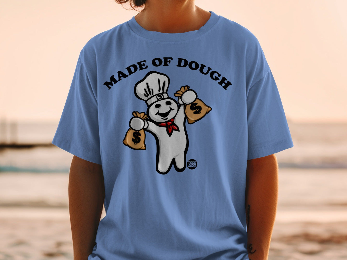 Pillsbury Doughboy with money bags, "Made of Dough" text.