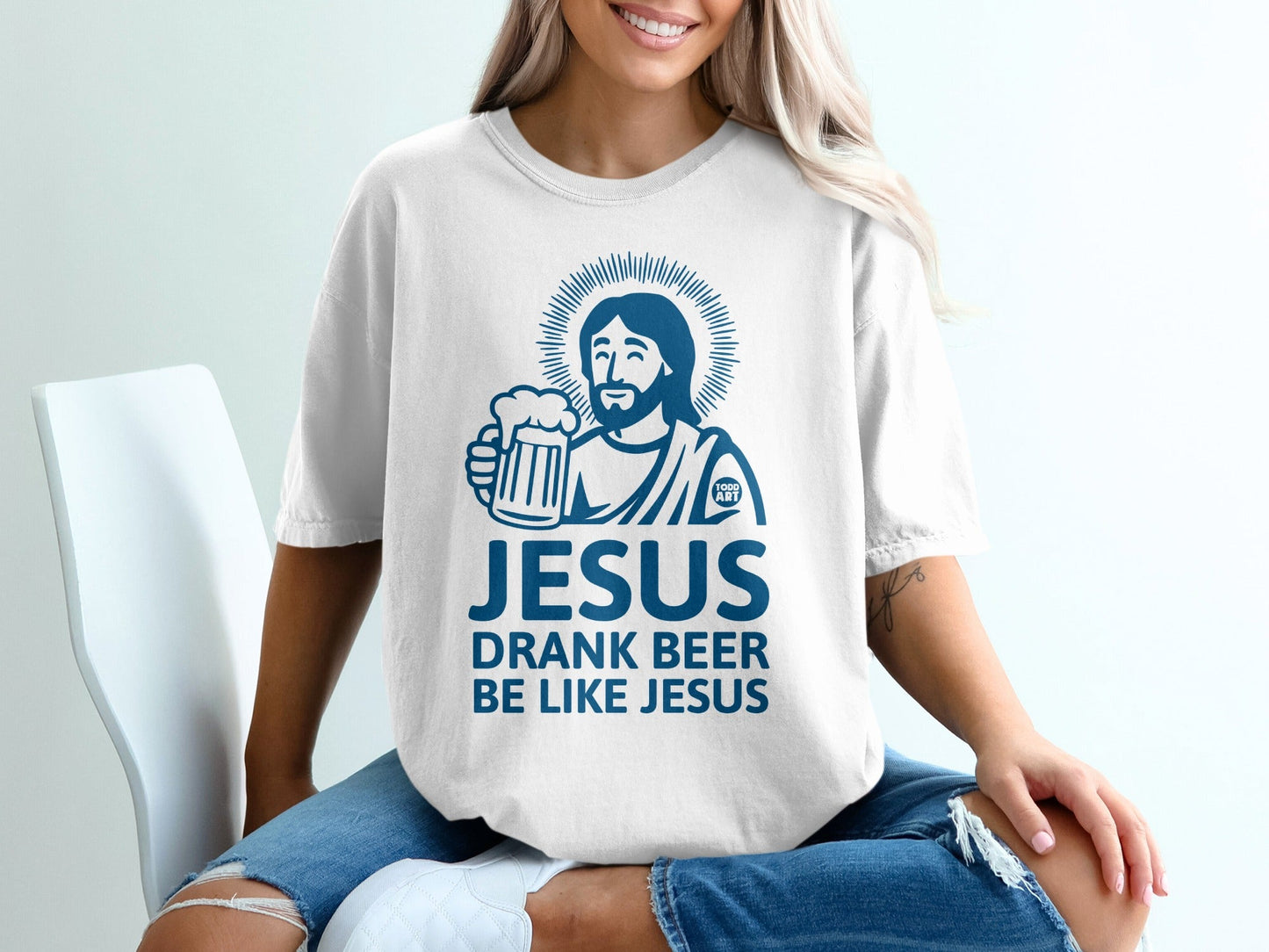 White t-shirt with Jesus holding a beer, text "JESUS DRANK BEER LIKE JESUS".