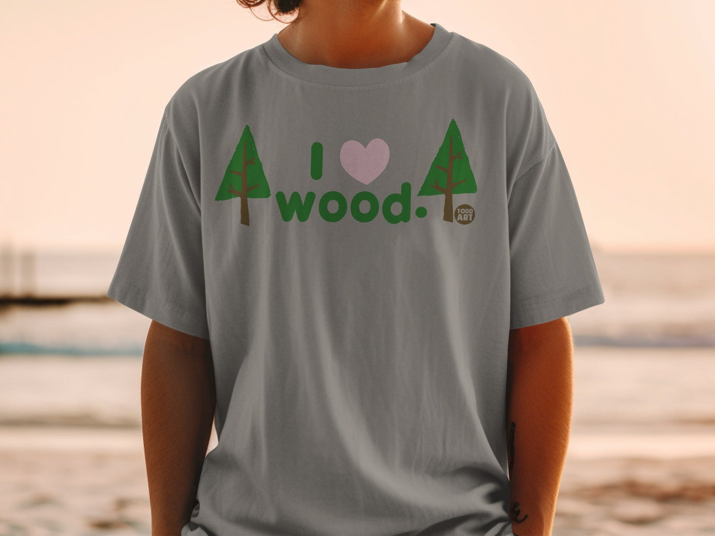 Gray t-shirt with "I ‚ù§Ô∏è wood." text and tree graphics.
