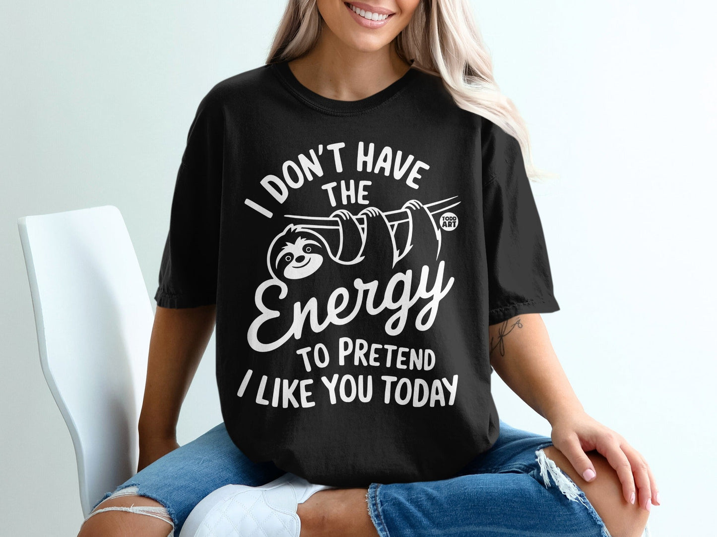 Black t-shirt with sloth graphic and text "I don't have the energy to pretend I like you today".