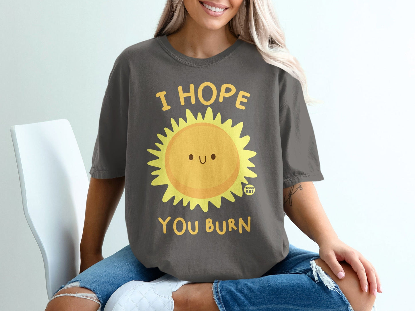 Dark gray t-shirt with a smiling sun graphic and text "I HOPE YOU BURN".