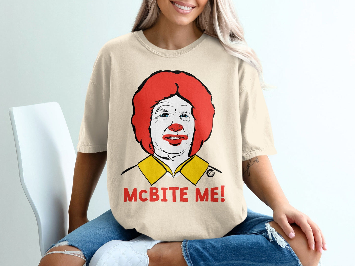 T-shirt featuring Ronald McDonald's face with text "McBite Me!".