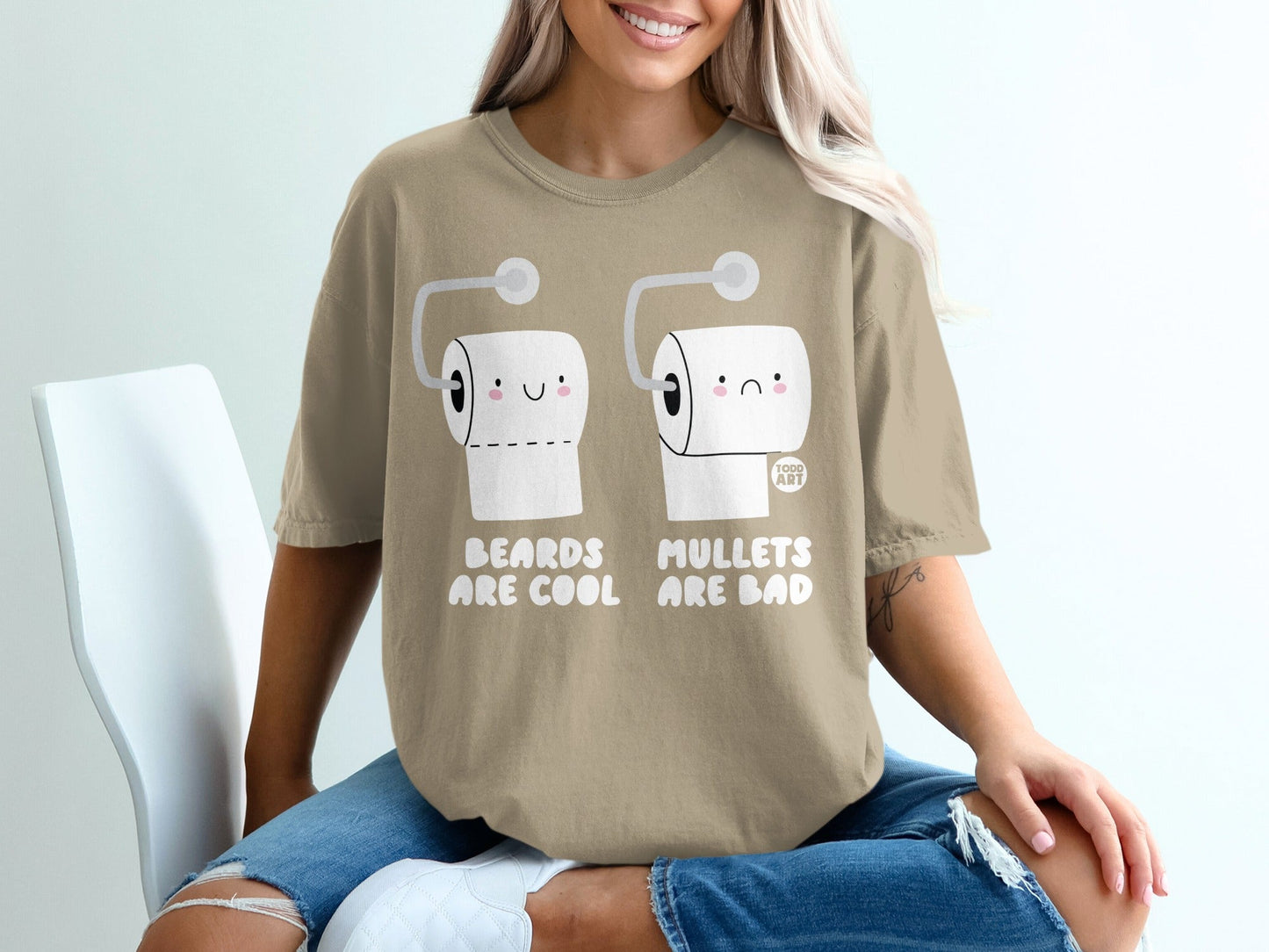 T-shirt with cartoon toilet paper rolls and "Beards Are Cool Mullets Are Bad" text.