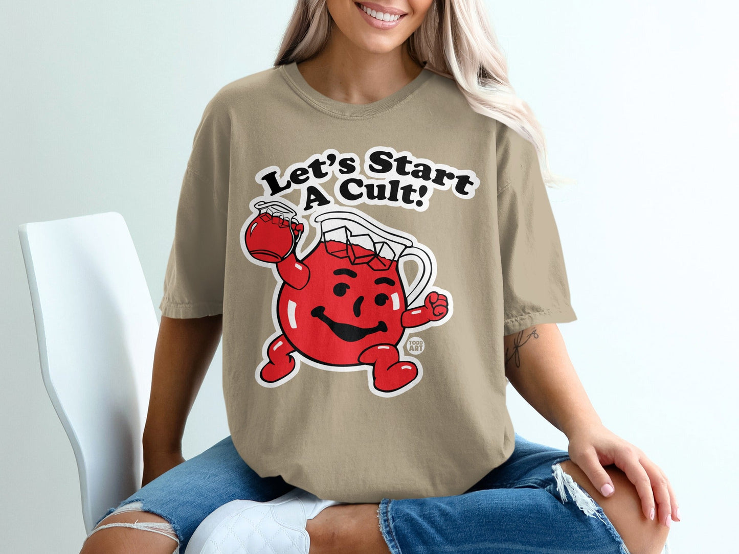 Cartoon Kool-Aid pitcher with text "Let's Start a Cult!"
