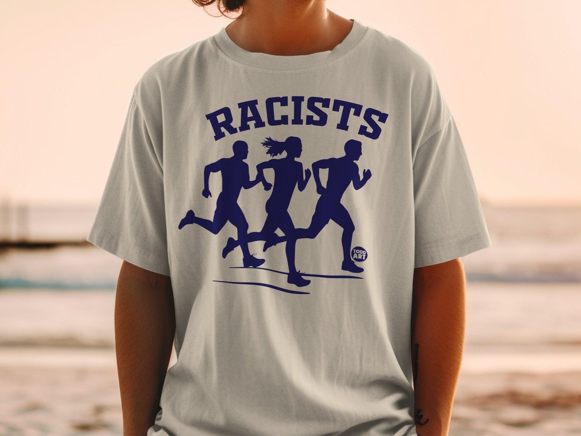 T-shirt with navy blue graphic of three runners and text "RACISTS".