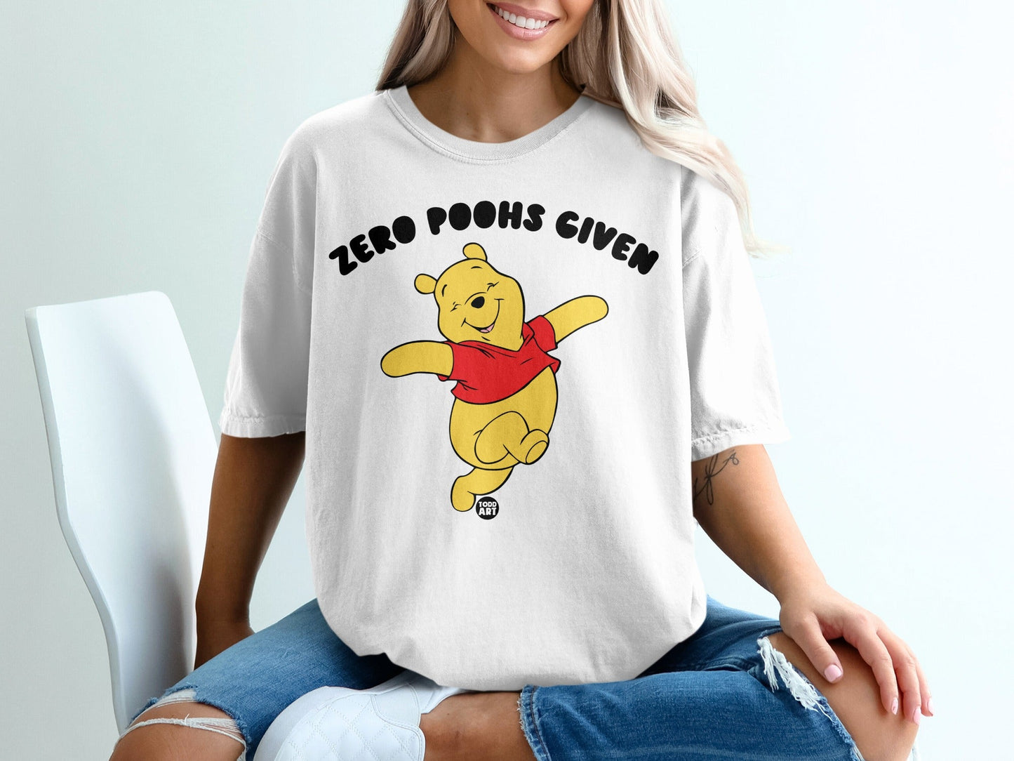 Winnie the Pooh t-shirt with text "ZERO POOHS GIVEN."