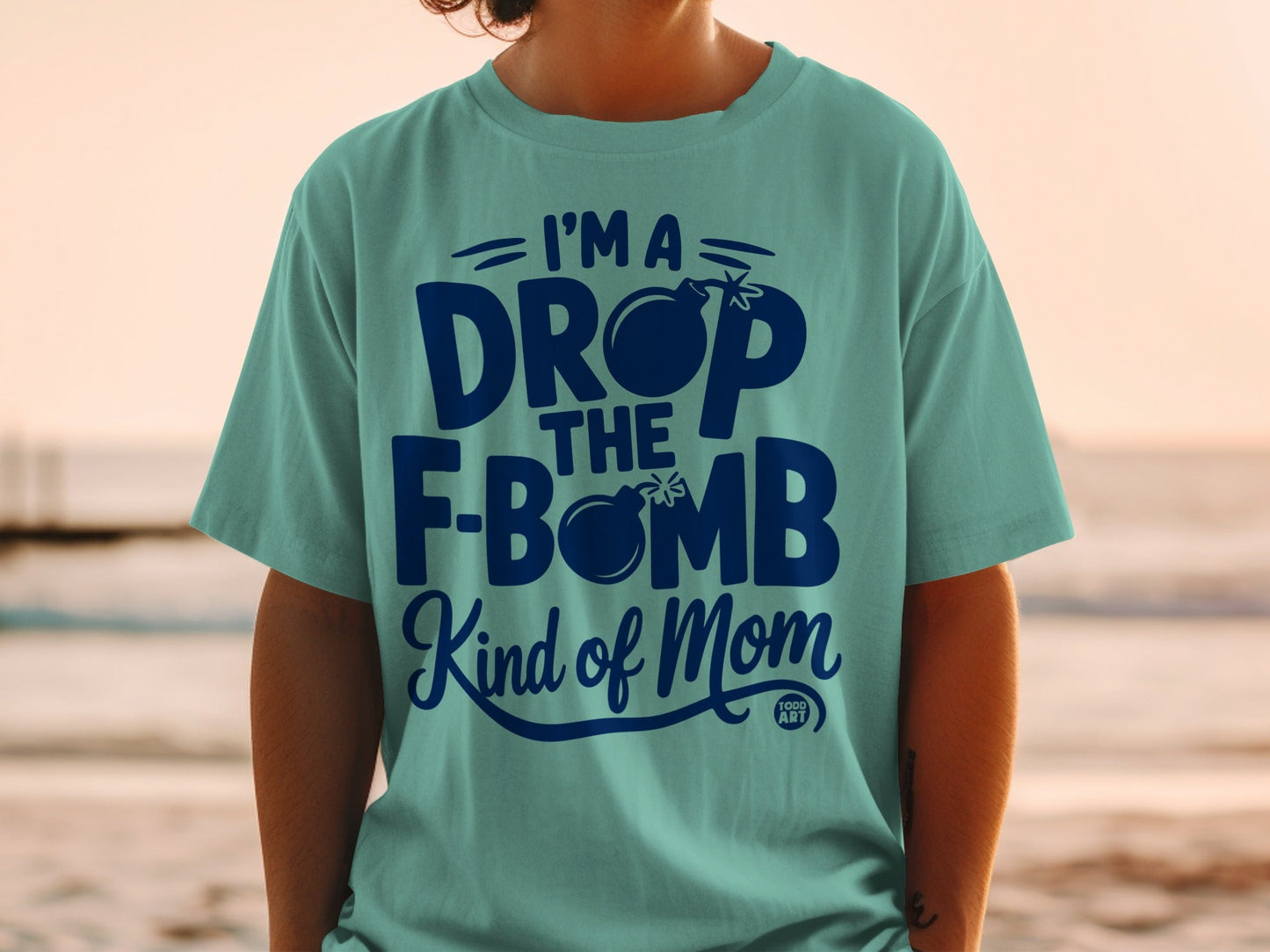 Teal t-shirt with "I'm a Drop The F-Bomb Kind of Mom" text.