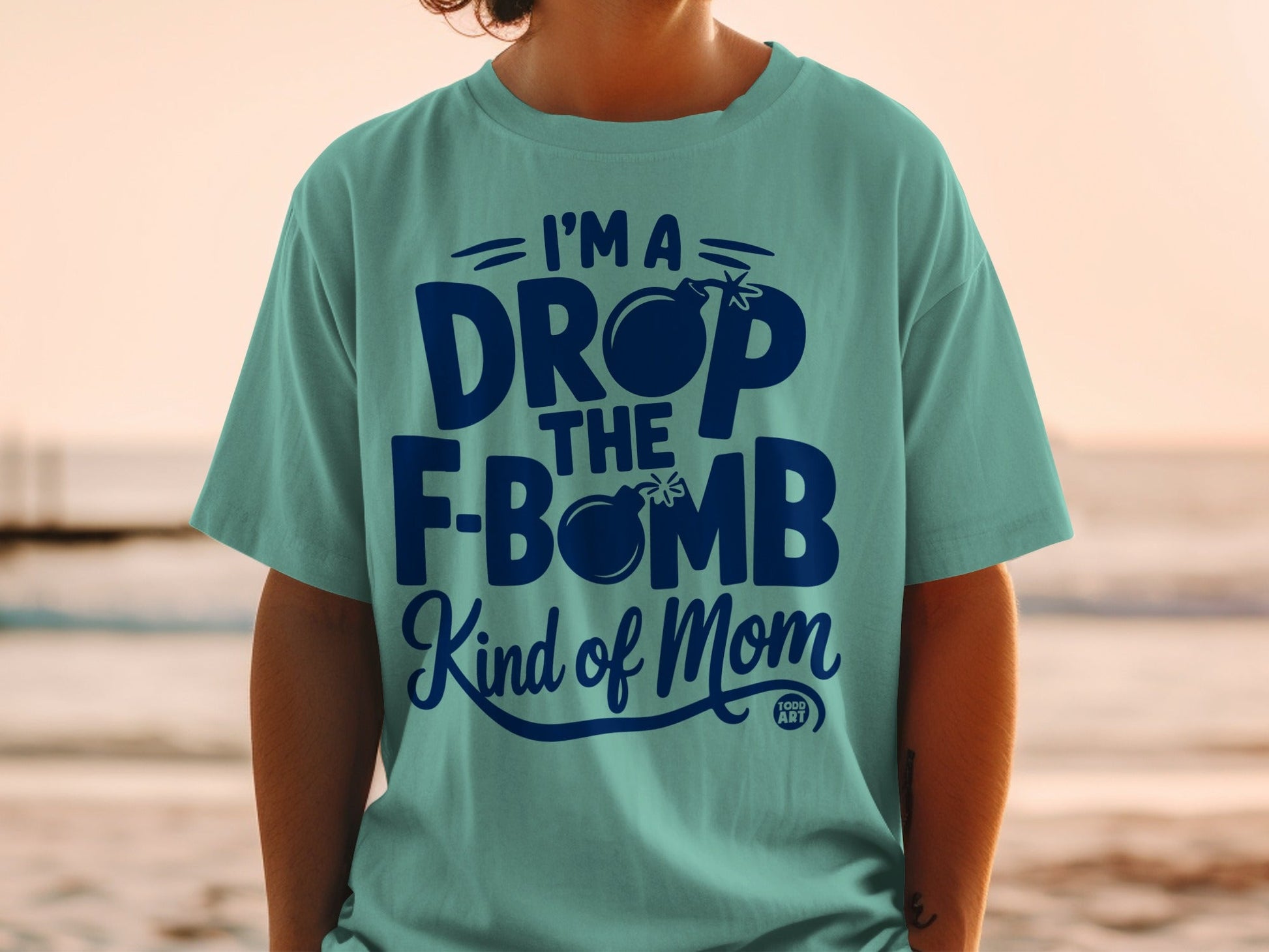 Teal t-shirt with "I'm a Drop The F-Bomb Kind of Mom" text.