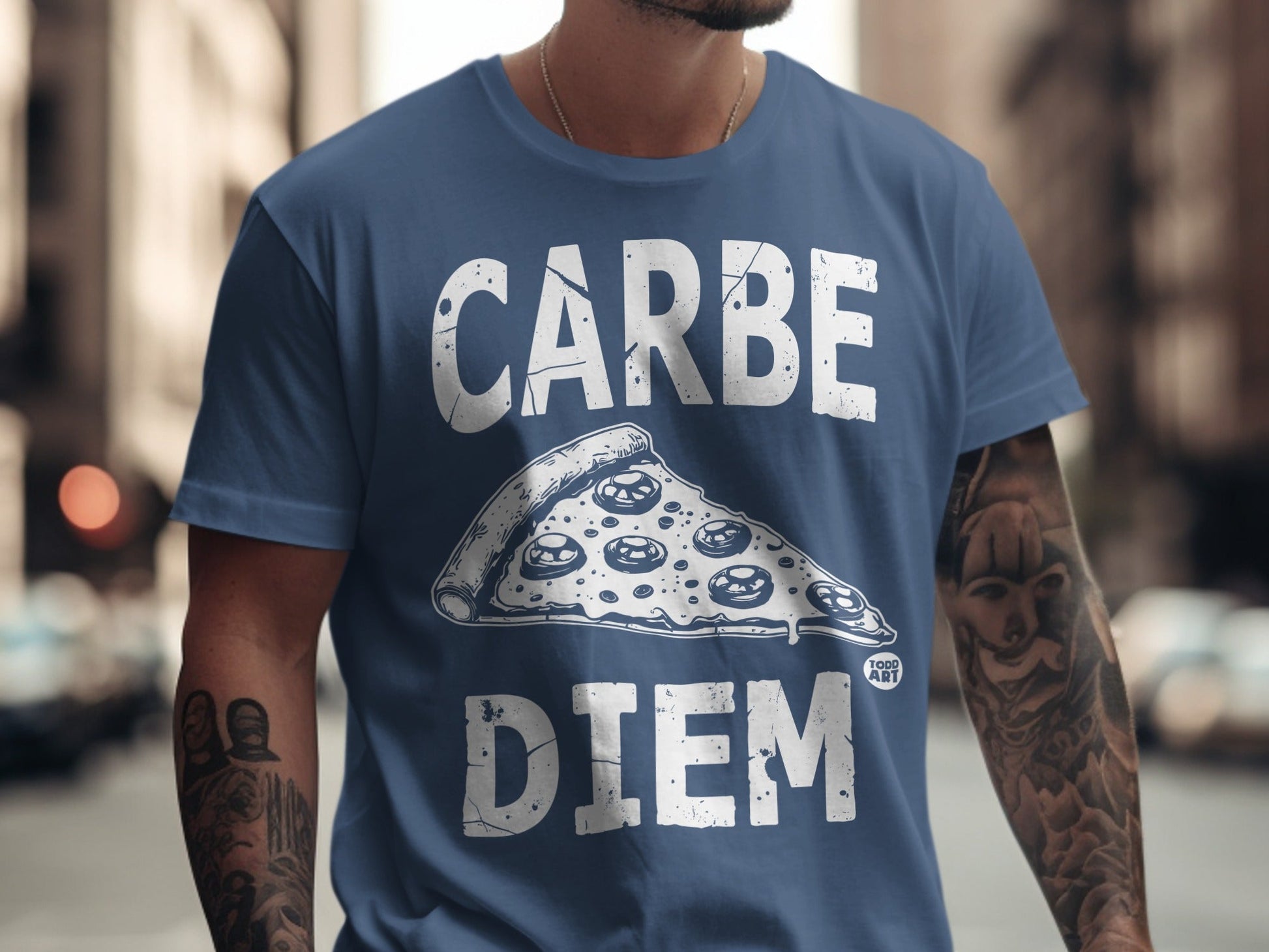 Blue t-shirt with "CARPE DIEM" and a pizza slice graphic.