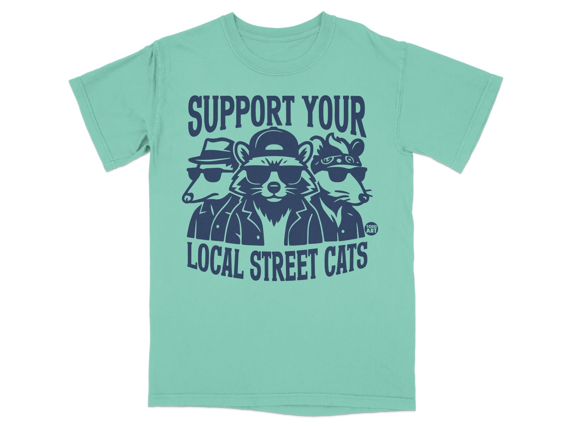 T-shirt with cartoon raccoons wearing sunglasses and hats, saying "Support your local street cats."