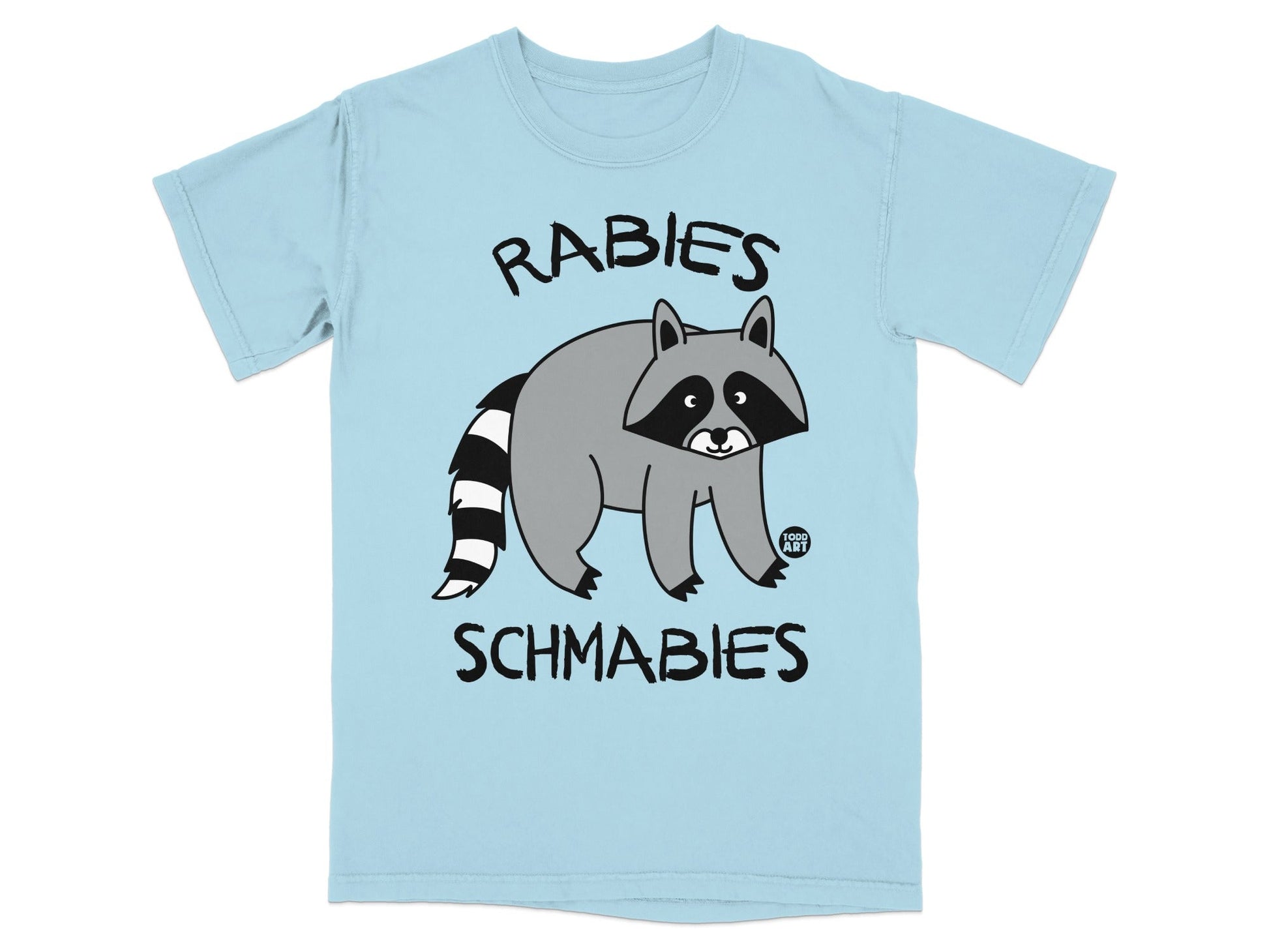 Light blue t-shirt with a cartoon raccoon and text "RABIES SCHMABIES".
