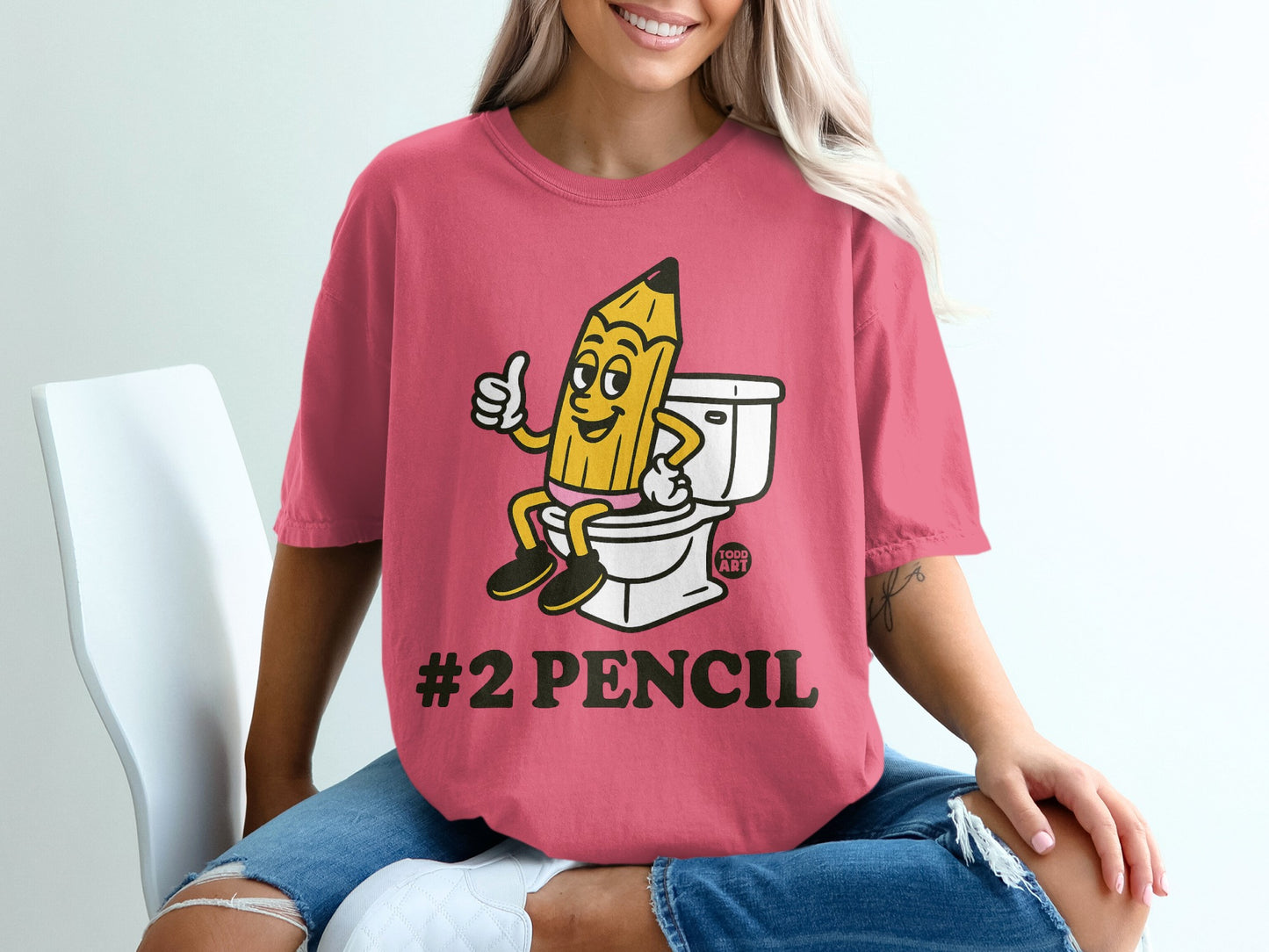 Cartoon #2 pencil giving a thumbs up while sitting on a toilet.
