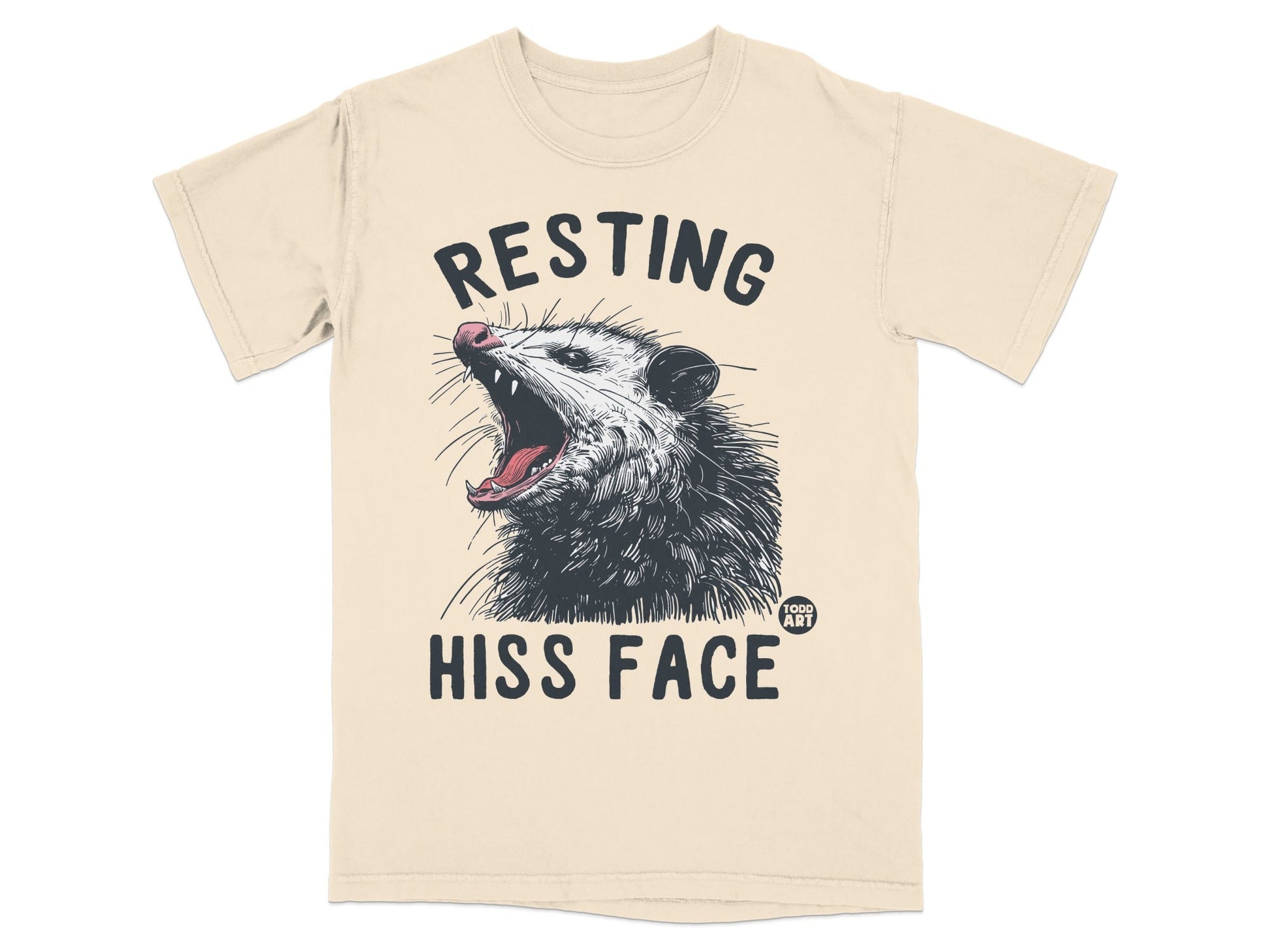 T-shirt with a drawing of an opossum's open mouth and "Resting Hiss Face" text.
