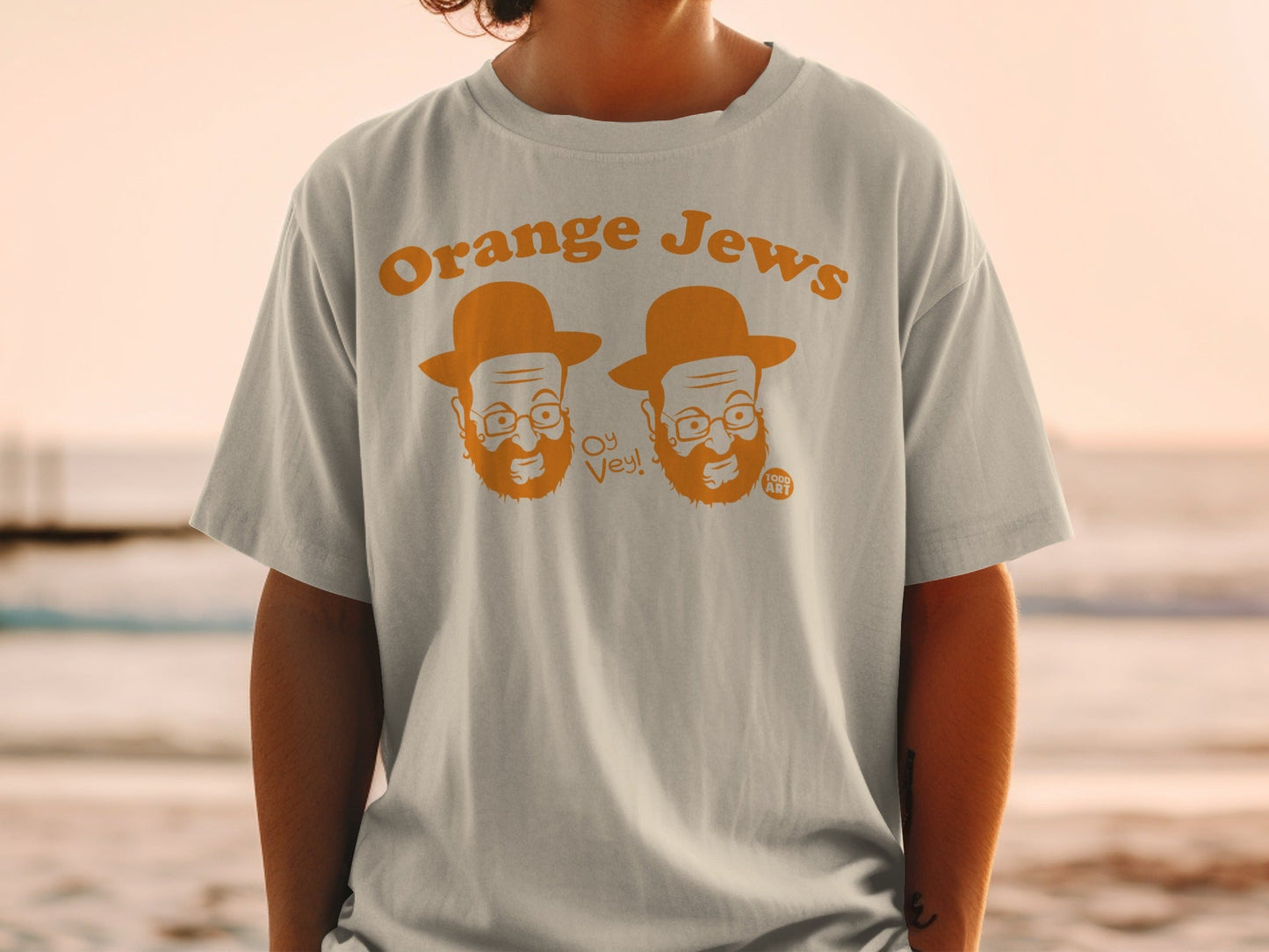 T-shirt with cartoon characters and text "Orange Jews Oy Vey!"