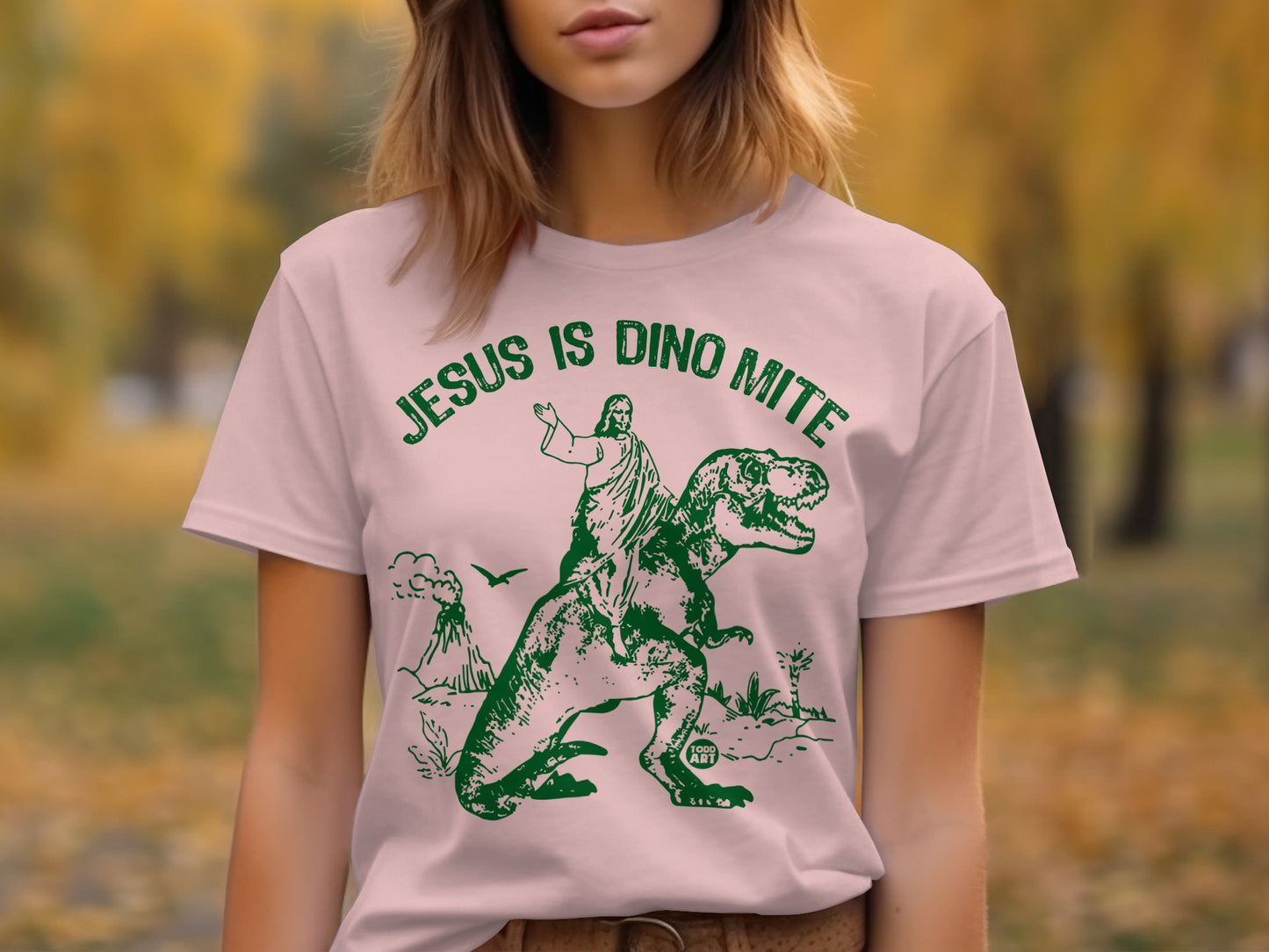 Jesus Is Dino Mite Graphic Tee Shirt product type