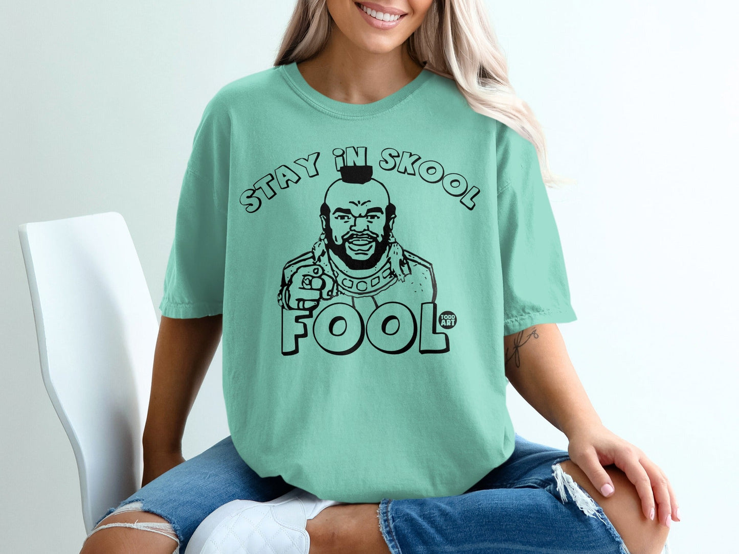 Mint green t-shirt with Mr. T saying "Stay in Skool Fool"