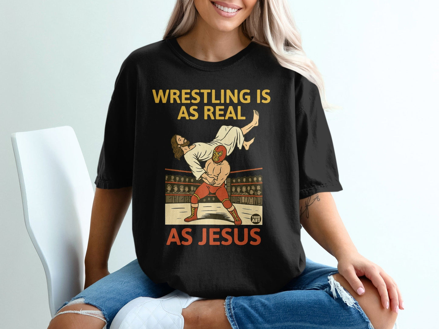Jesus wrestling in a ring, text reads "Wrestling is real as Jesus".