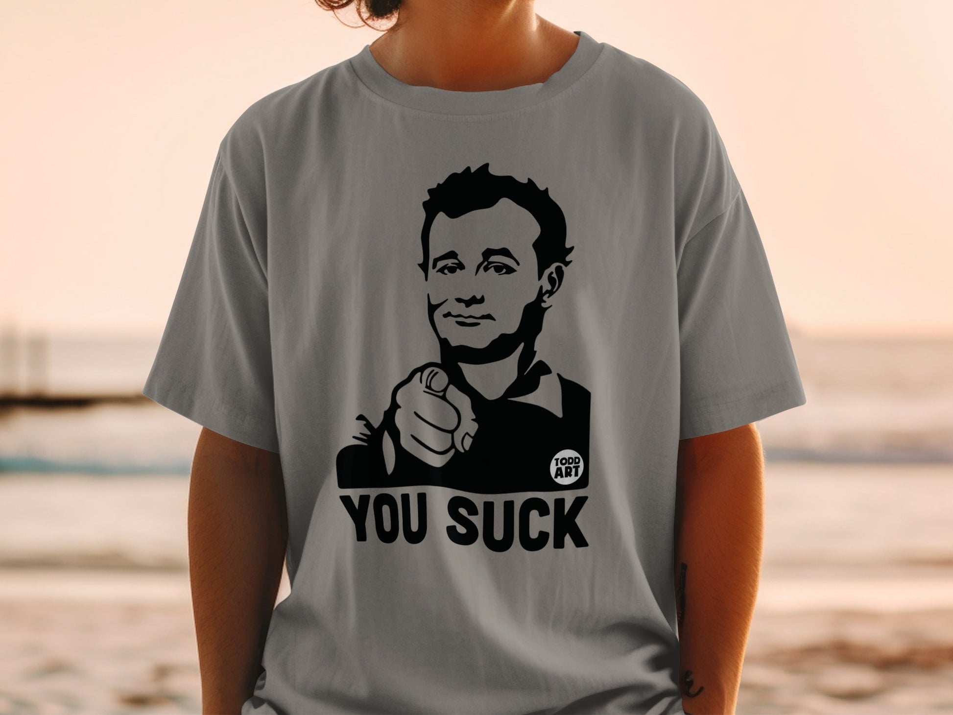 Gray t-shirt with Bill Murray pointing and text "YOU SUCK".