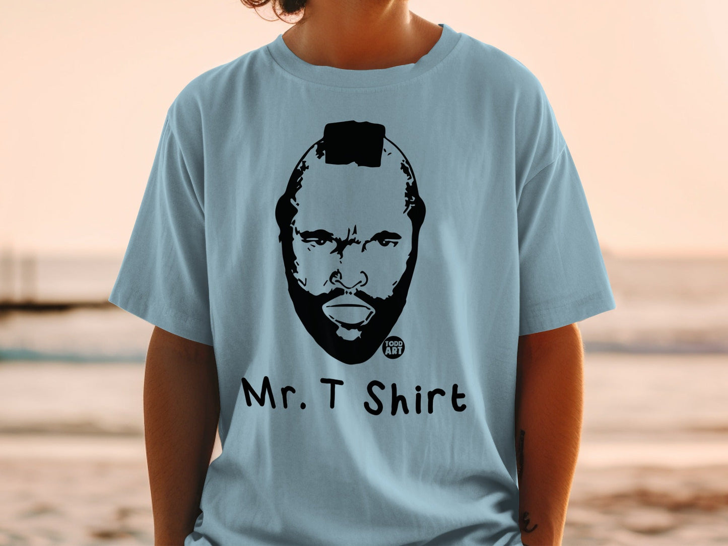 Light blue t-shirt with Mr. T portrait and "Mr. T SHIRT" text.