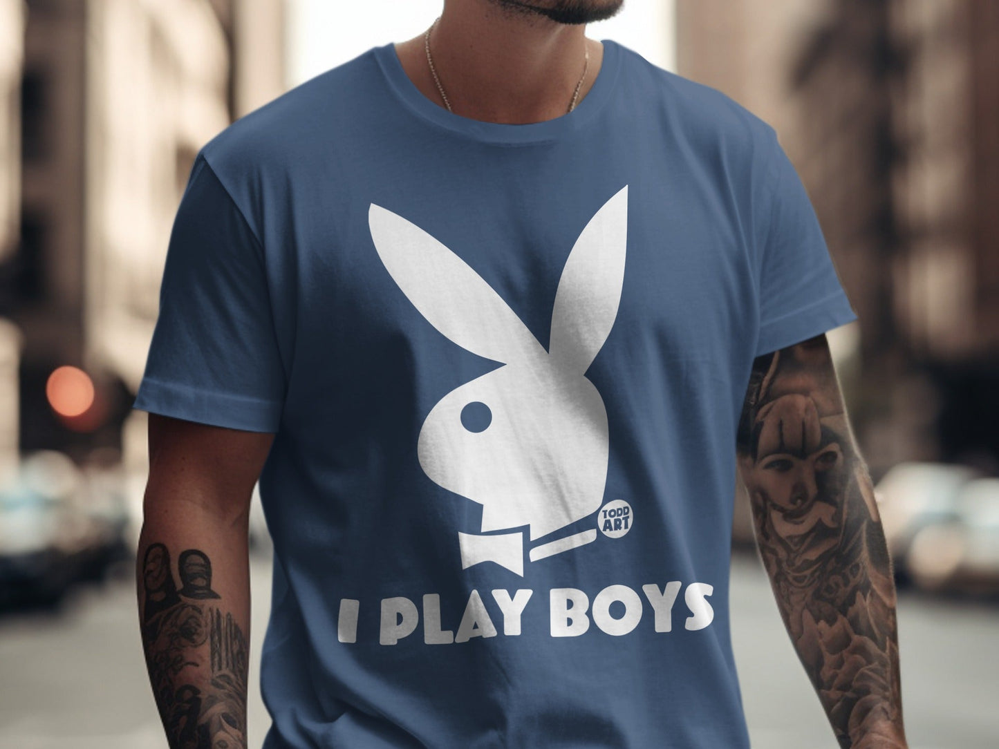 Blue t-shirt with white Playboy bunny logo and "I PLAY BOYS" text.