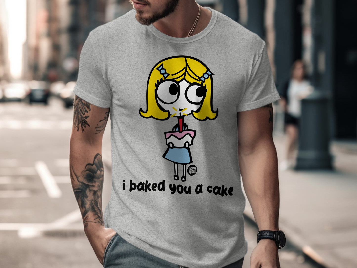 Quirky Graphic Tee with Fun Cartoon and Cake Design