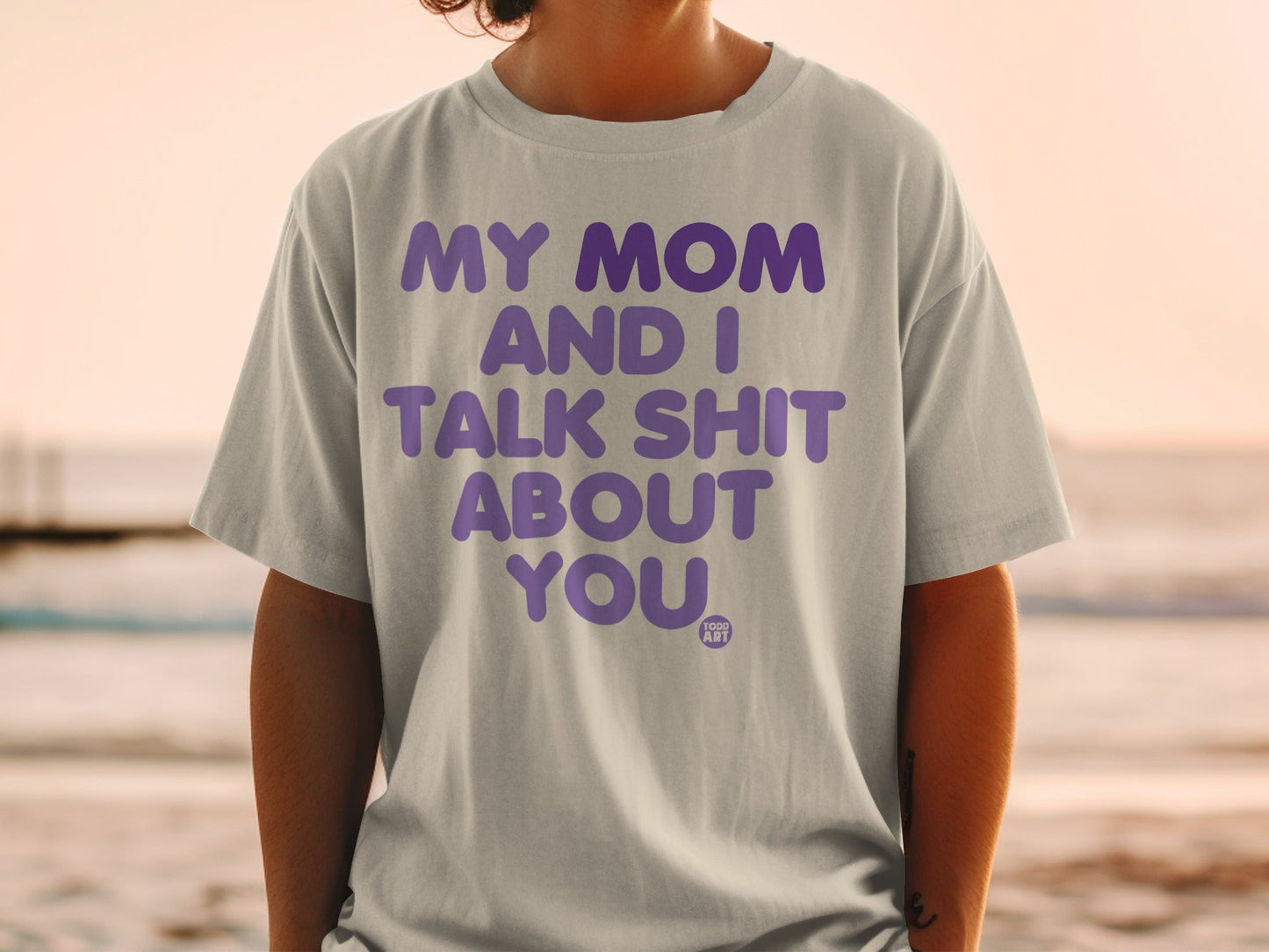 T-shirt with purple text "MY MOM AND I TALK SHIT ABOUT YOU".