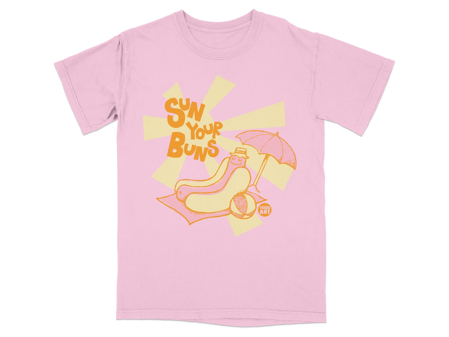Pink t-shirt with a hot dog wearing a hat and holding an umbrella on a beach.
