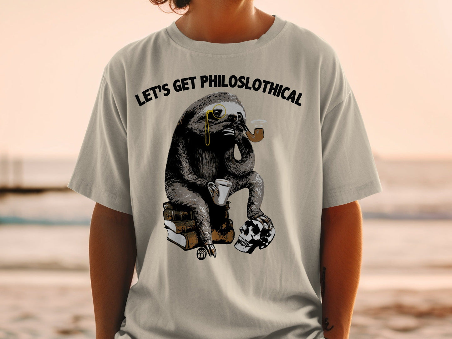 Sloth wearing monocle, smoking pipe, holding coffee cup, sitting on books and skull.