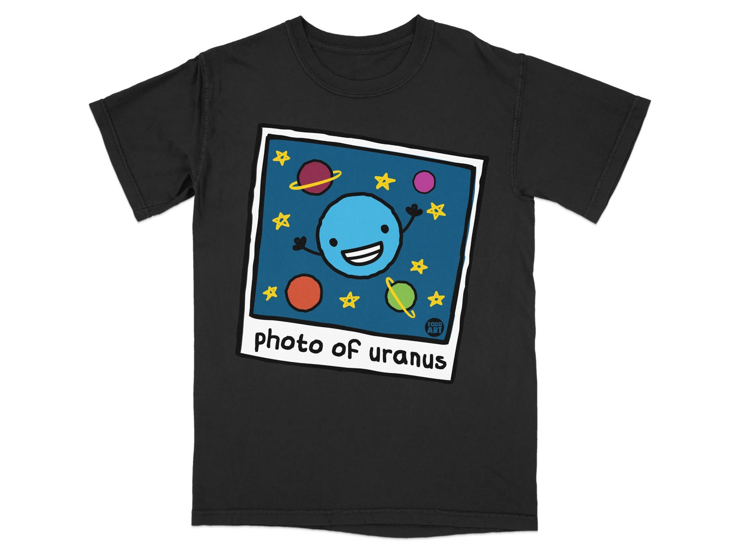 Black t-shirt with a polaroid-style photo of a smiling blue planet with stars.