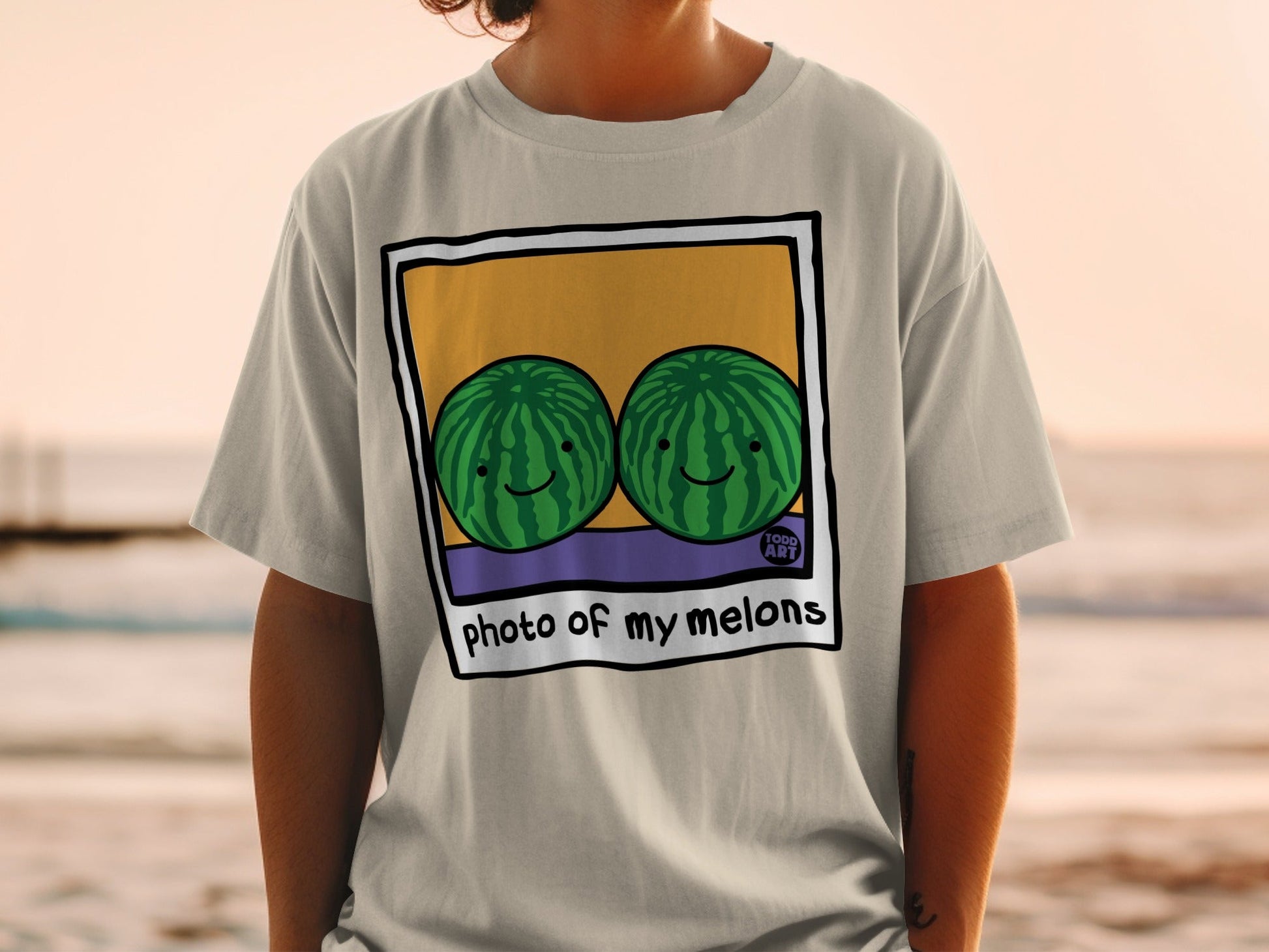 T-shirt with cartoon watermelons saying "photo of my melons".