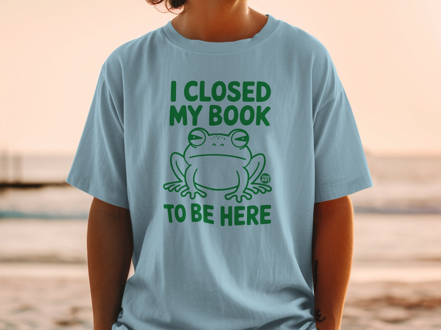 I Closed My Book To Be Here Funny Frog Graphic T-Shirt
