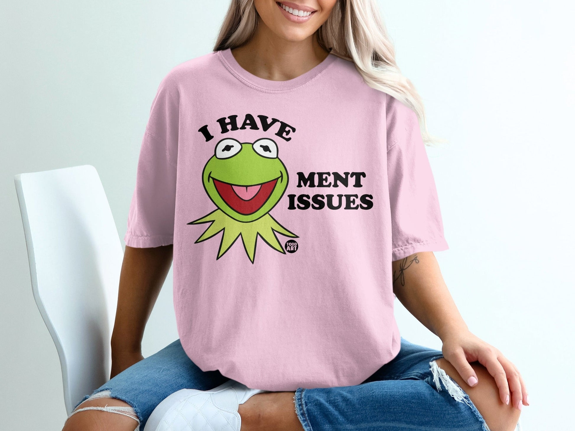 Pink t-shirt with Kermit the Frog graphic saying "I have ment issues".