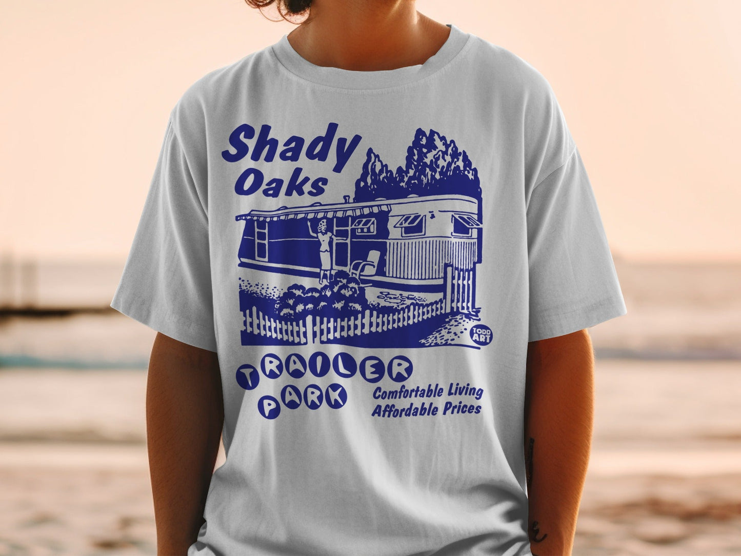 Shady Oaks Trailer Park t-shirt with cartoon illustration and text.