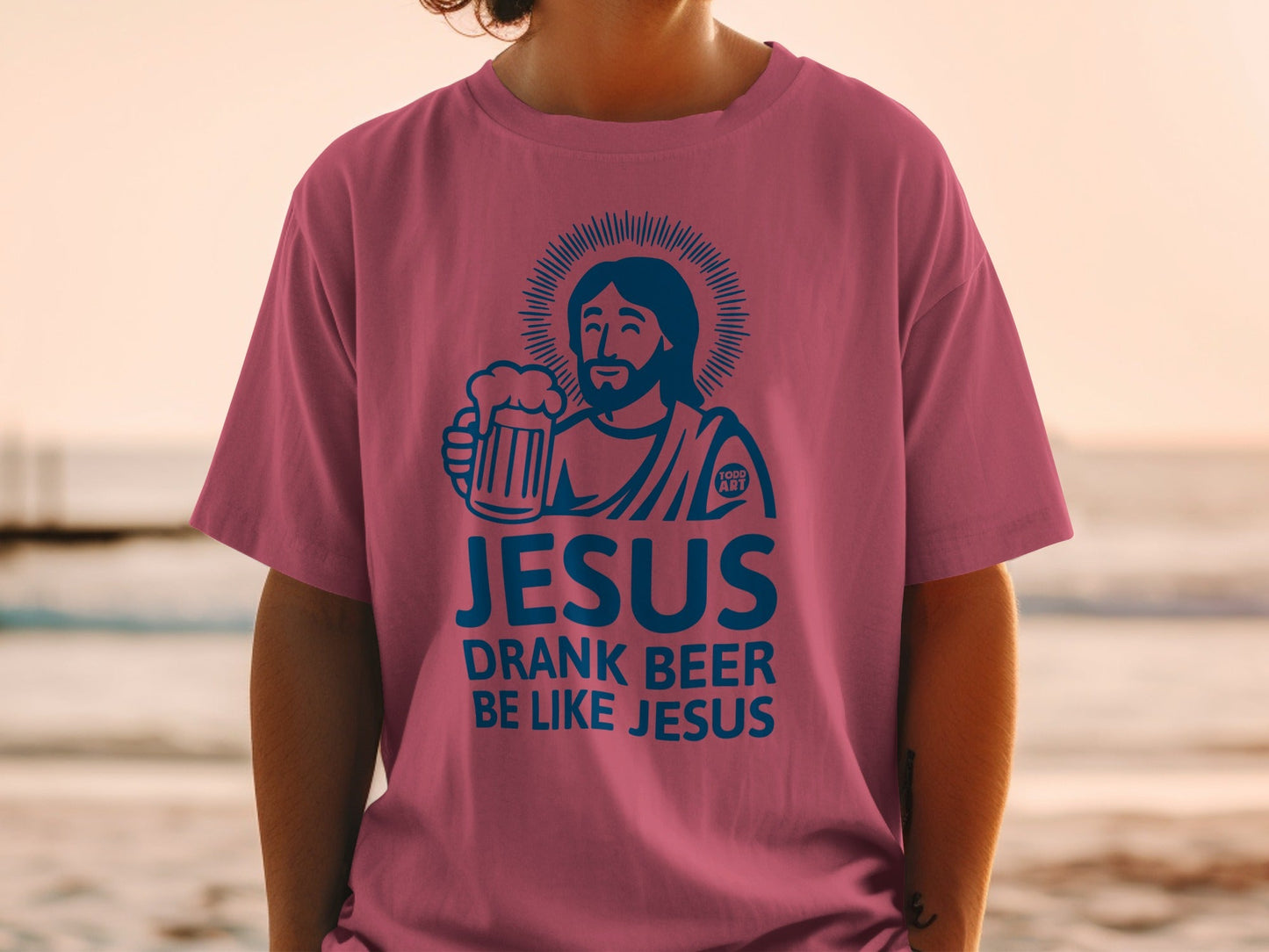 T-shirt with Jesus holding a beer and text "DRANK BEER BE LIKE JESUS".