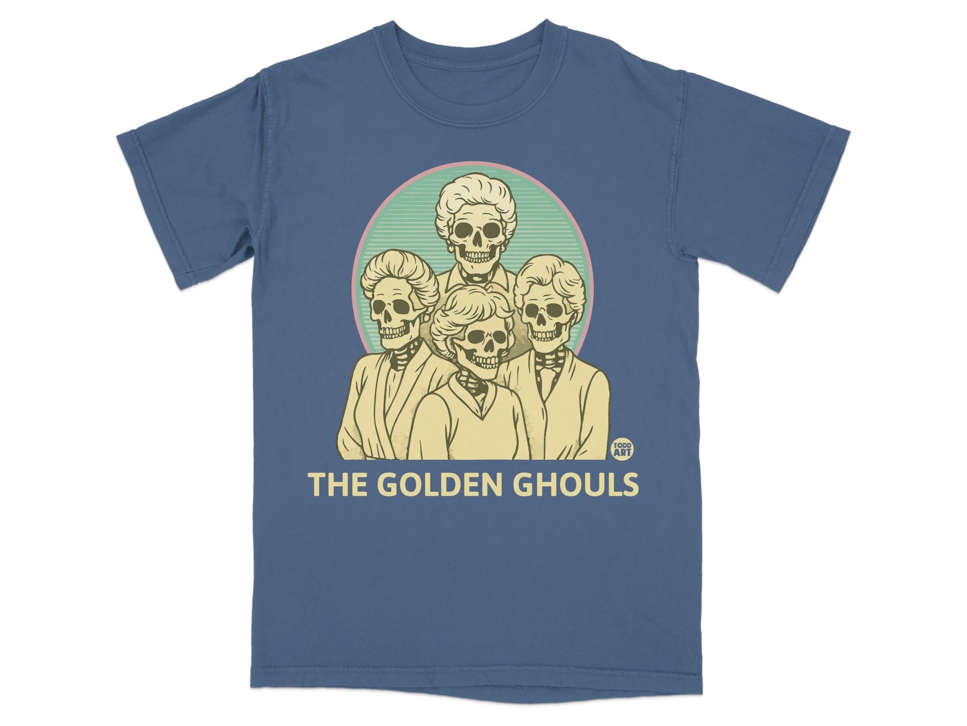 Blue t-shirt with "The Golden Ghouls" text and skull portraits.