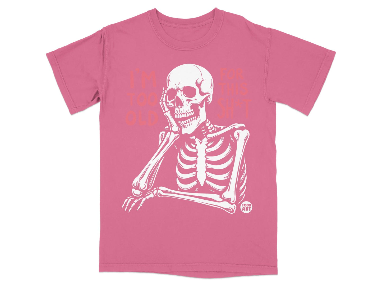 Pink t-shirt with a skeleton resting its head and text "I'M TOO OLD FOR THIS SHIT".
