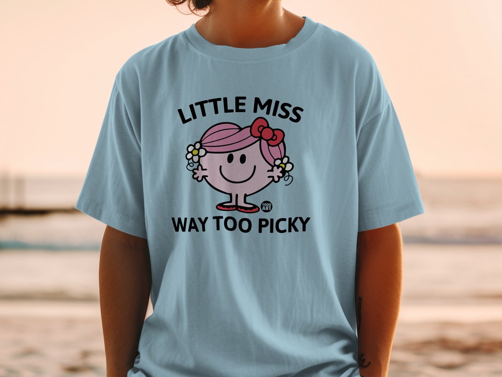 Light blue t-shirt with "Little Miss Way Too Picky" text and character graphic.