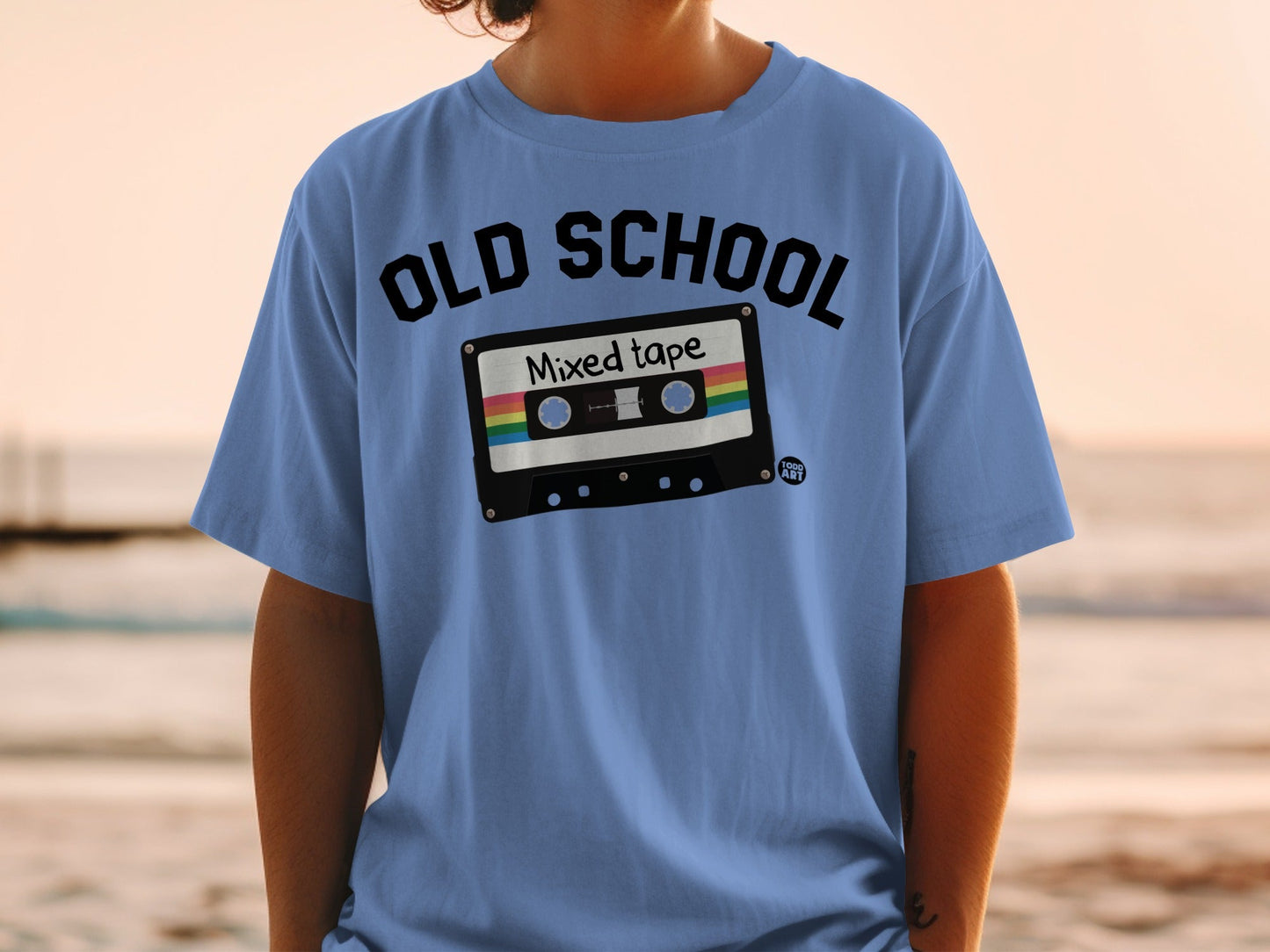 Blue t-shirt with black "OLD SCHOOL" text and a colorful cassette tape graphic.