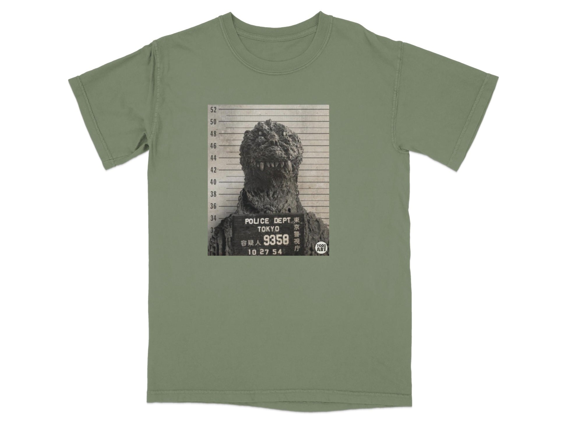 Godzilla mugshot on a Tokyo police department t-shirt.