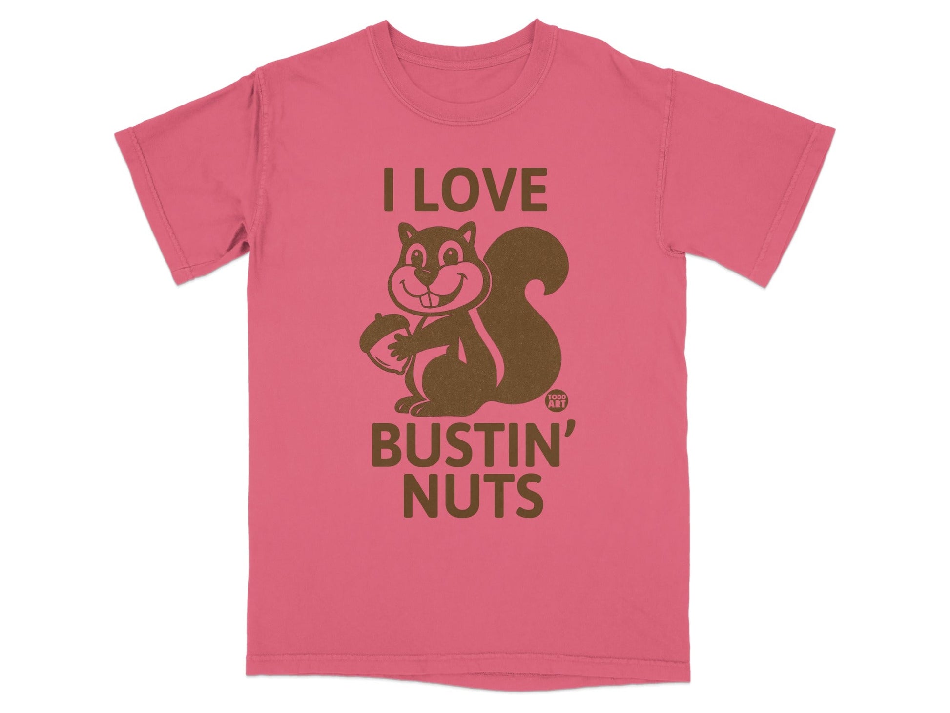 Pink t-shirt with cartoon squirrel holding acorn and text "I Love Bustin' Nuts".