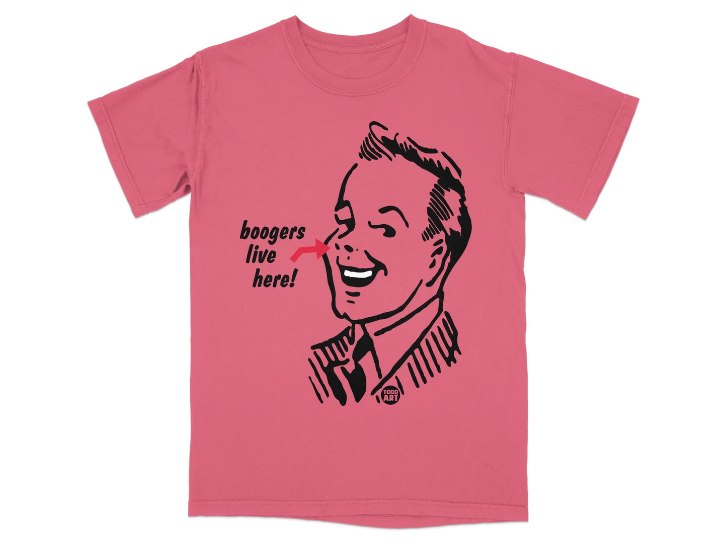 Coral t-shirt with a black graphic of a smiling man pointing to his nose, saying "boogers live here!".