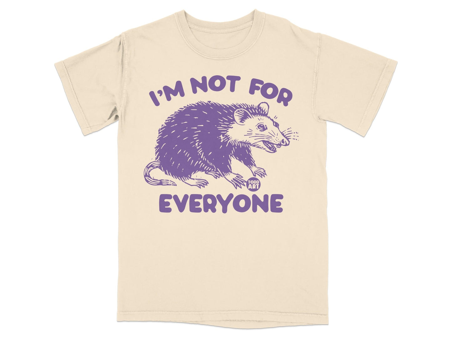 Cream t-shirt with purple opossum and "I'm not for everyone" text.